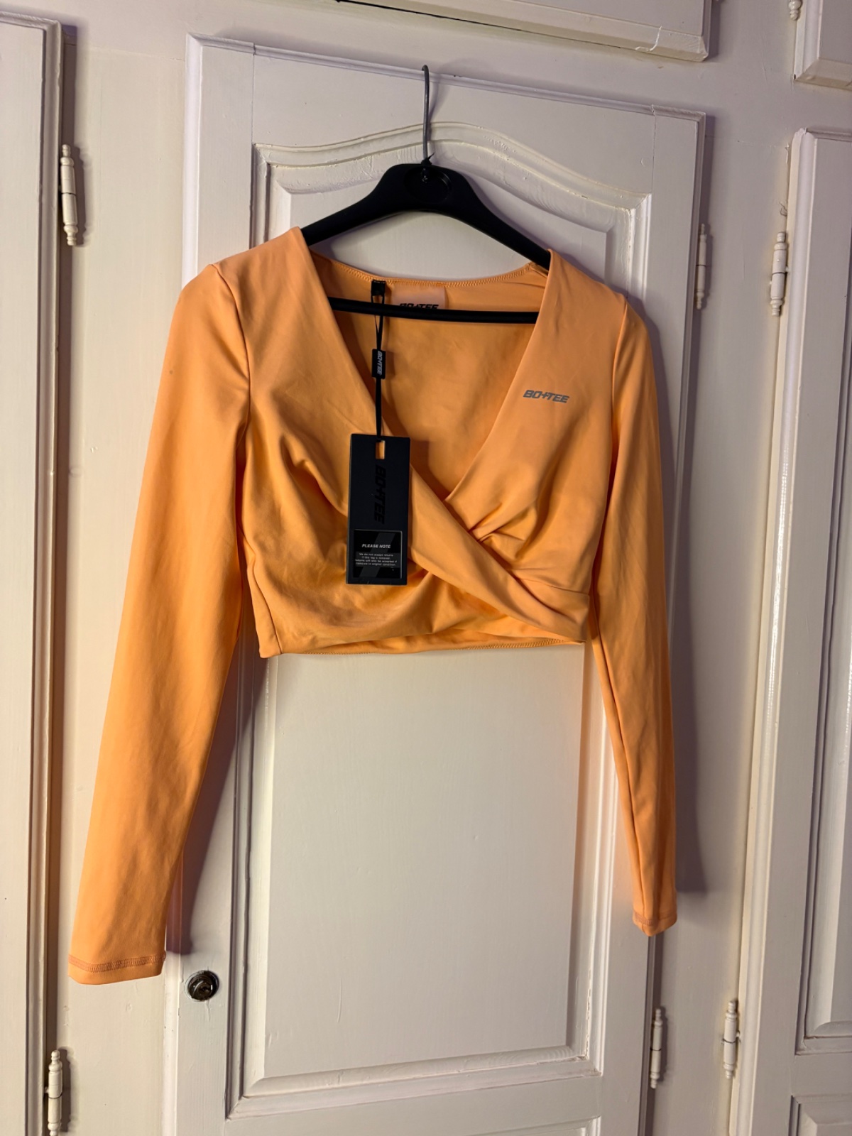 Pull sport orangé