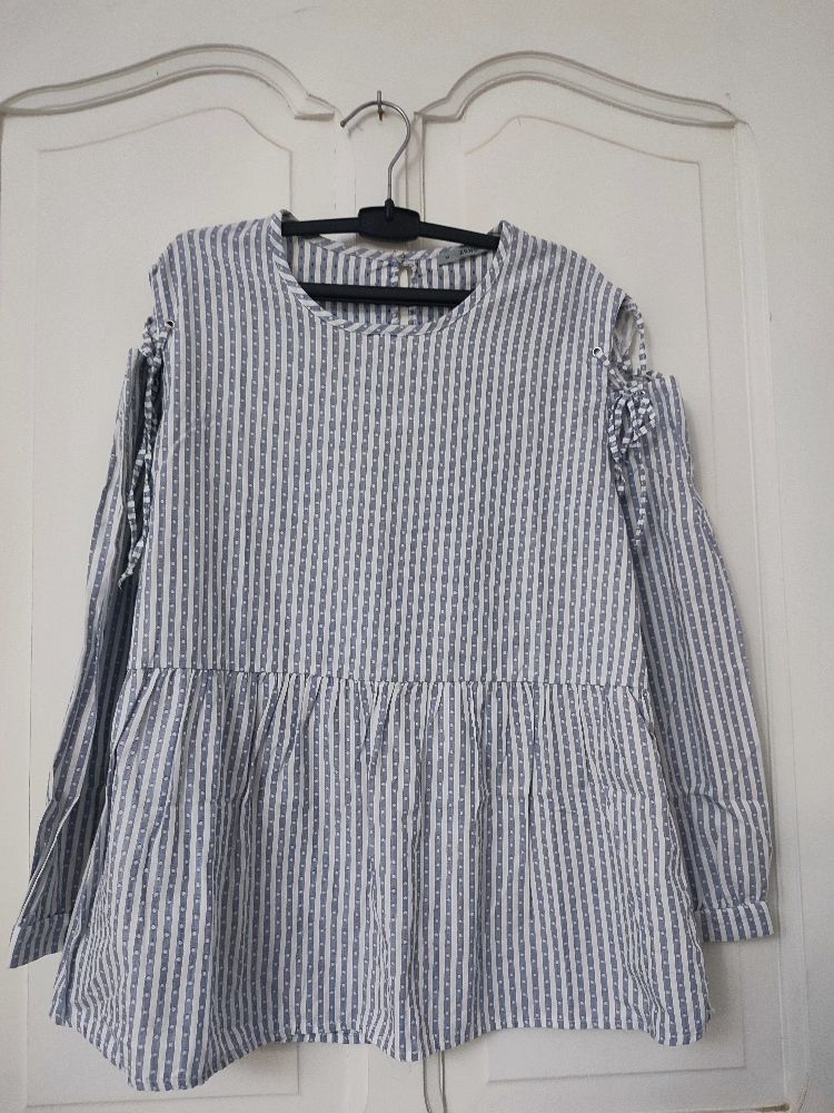 Chemise avec des rayures bleues 