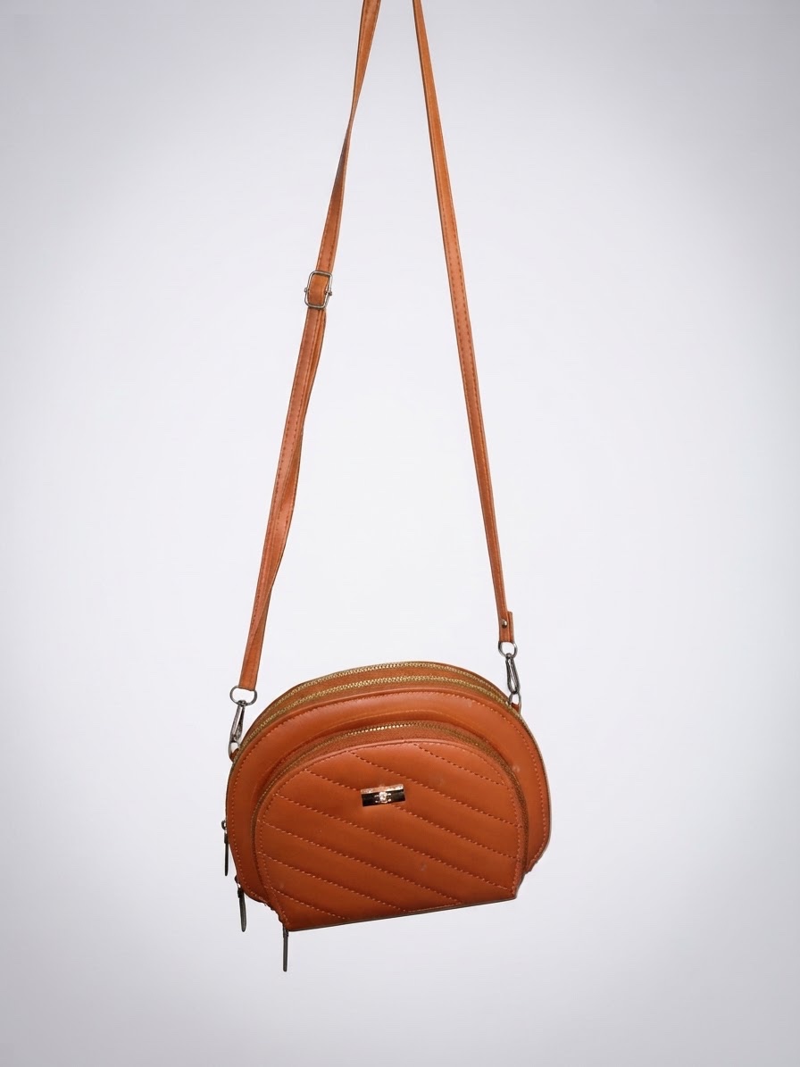 Small caramel-brown crossbody shoulder bag