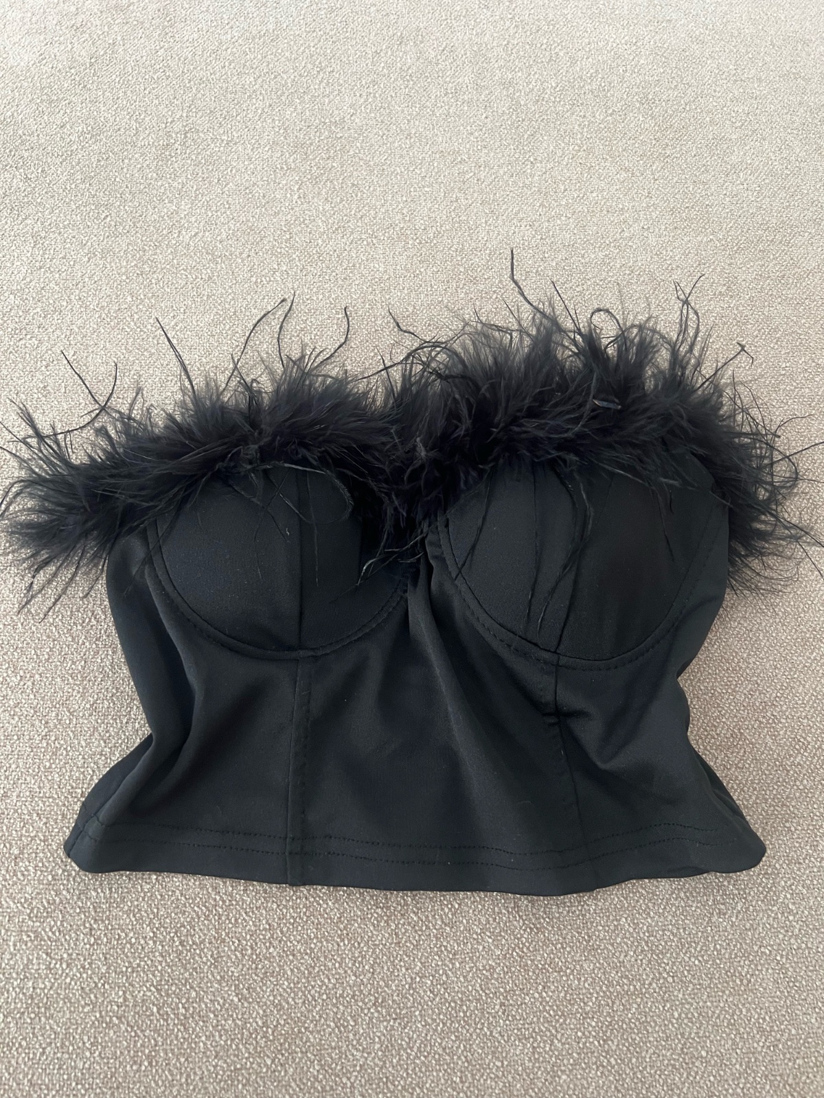 Pull noir bustier