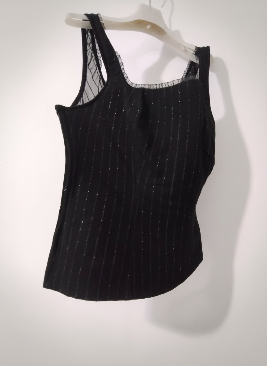 Un tres beau haut bustier noir avec rayures argentés