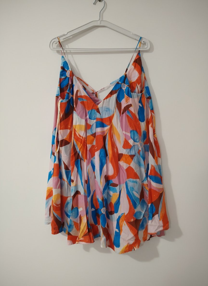 Une blouse bretelle taille 38