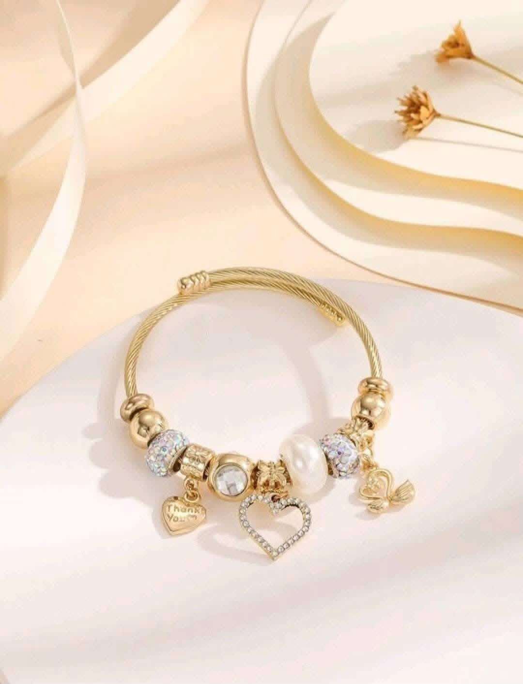 Bracelet avec fétiches acier inoxydable 