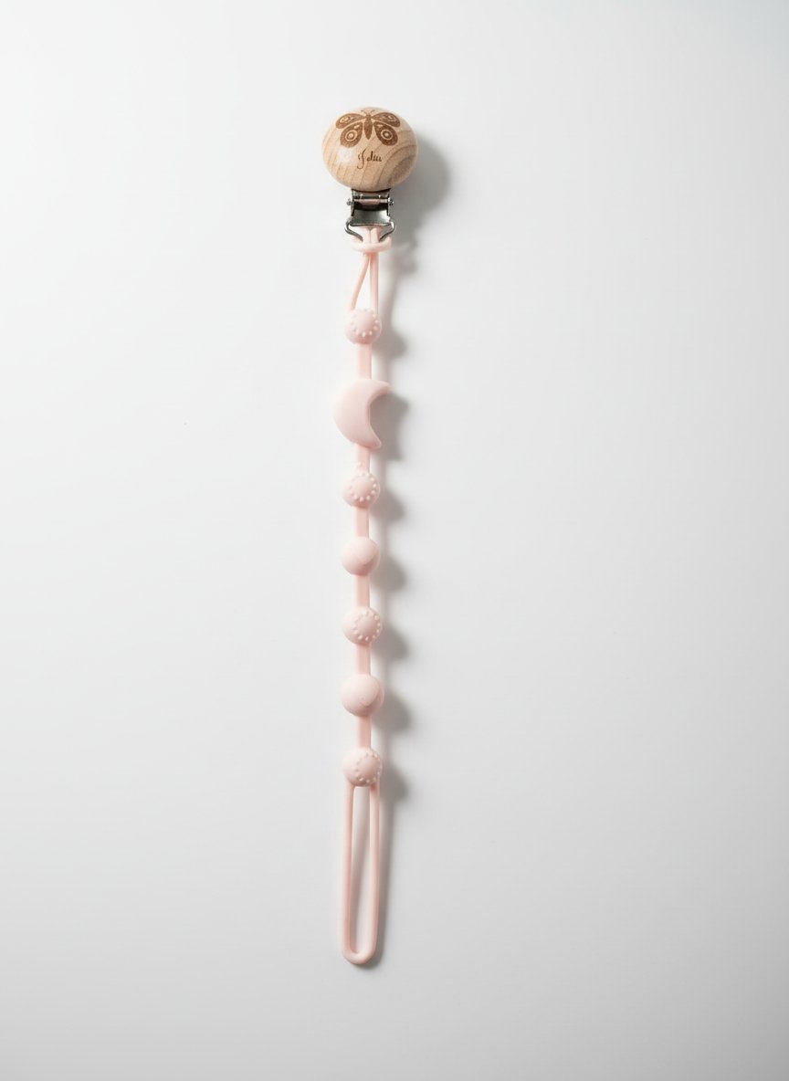 Attache tétine