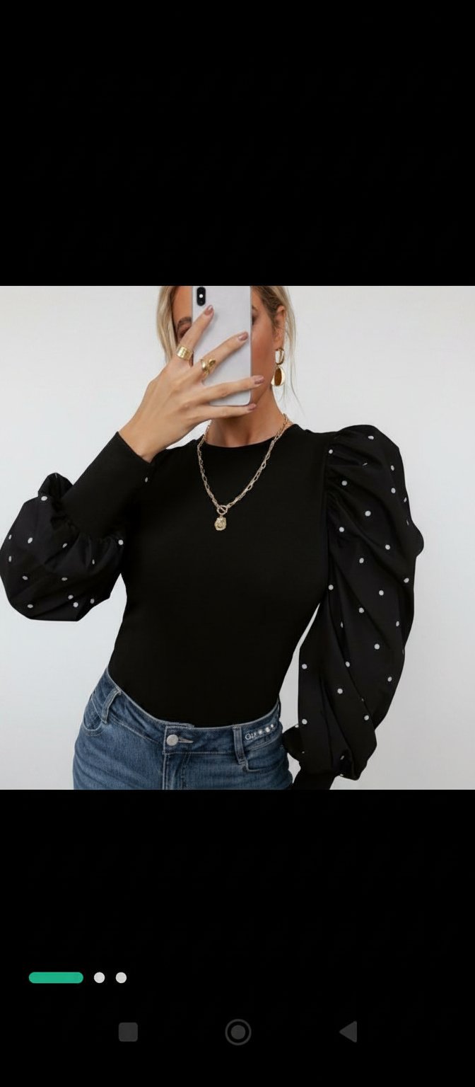 Top a manches bouffantes 