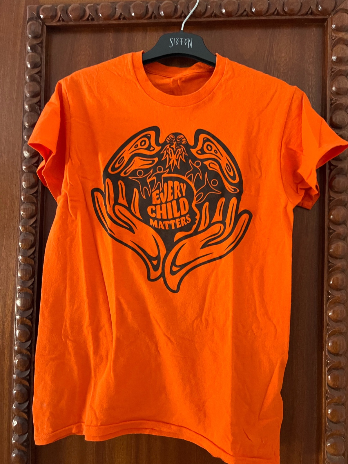 Pull homme orange