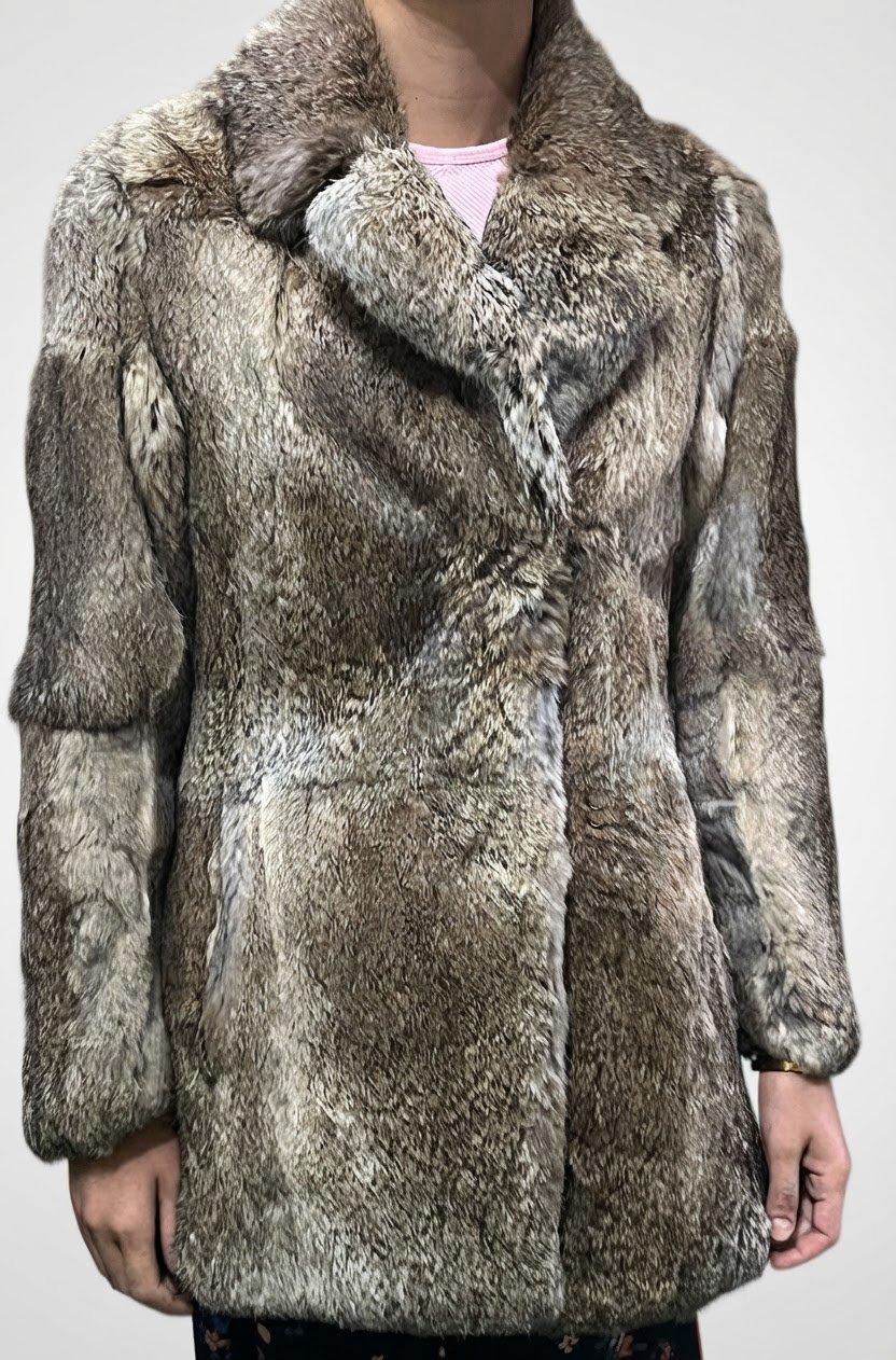 Manteau effet fausse fourrure chic