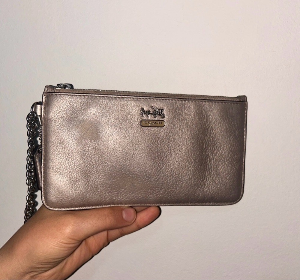 Pochette coach authentique