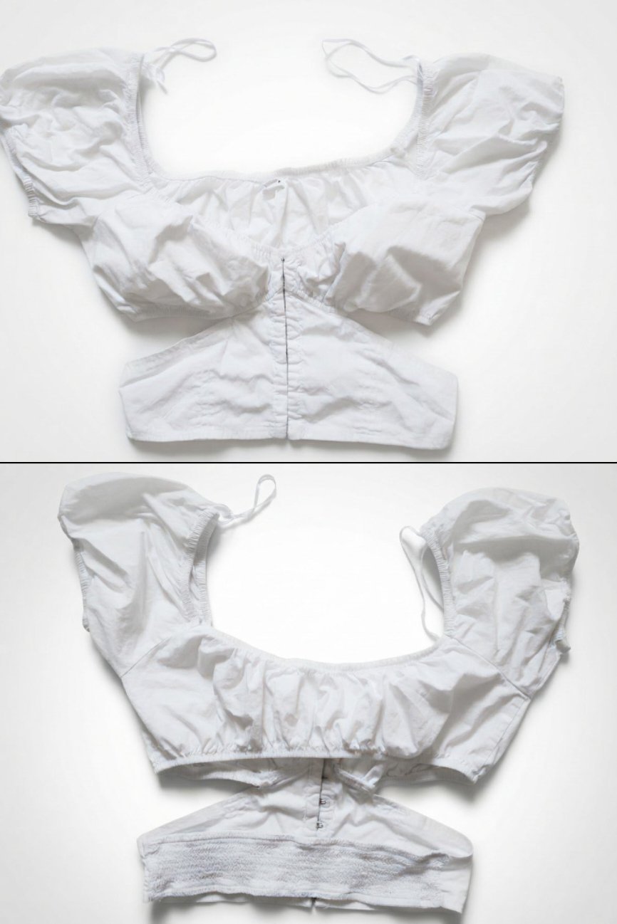 Craquez pour ce magnifique crop top blanc ultra tendance et féminin ! Avec ses découpes "cut-out" originales sur les côtés et ses jolies manches bouffantes