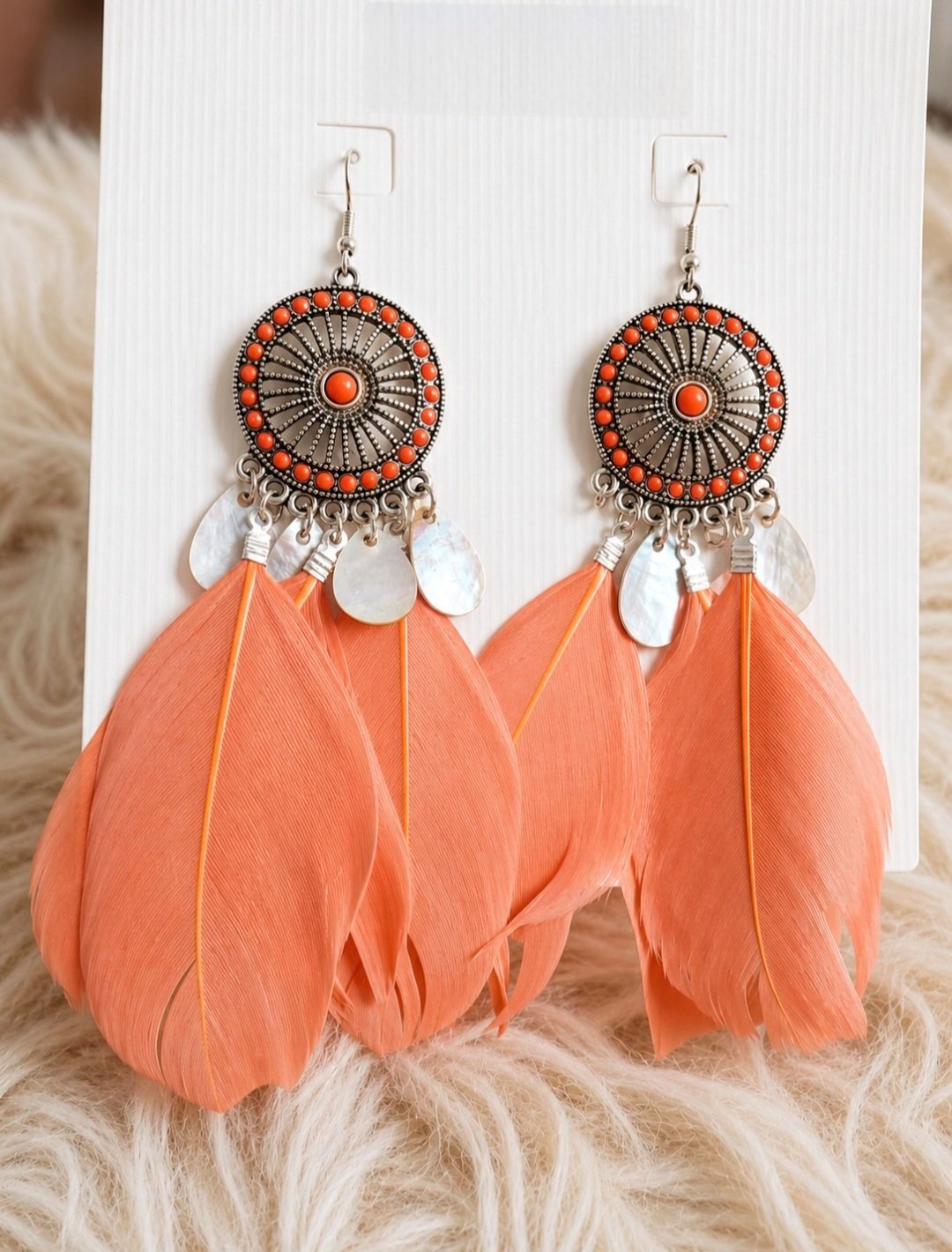 Boucles d'oreilles plumes orange – Style bohème