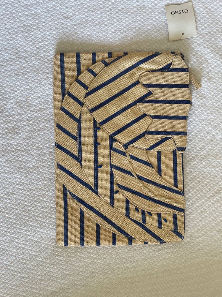 Pochette bleu et beige Oysho