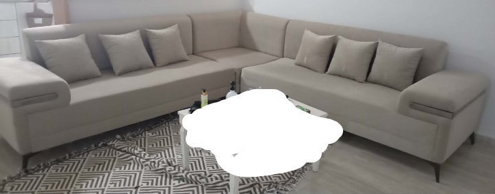 Salon forme L spacieuse en tres tres bon etat