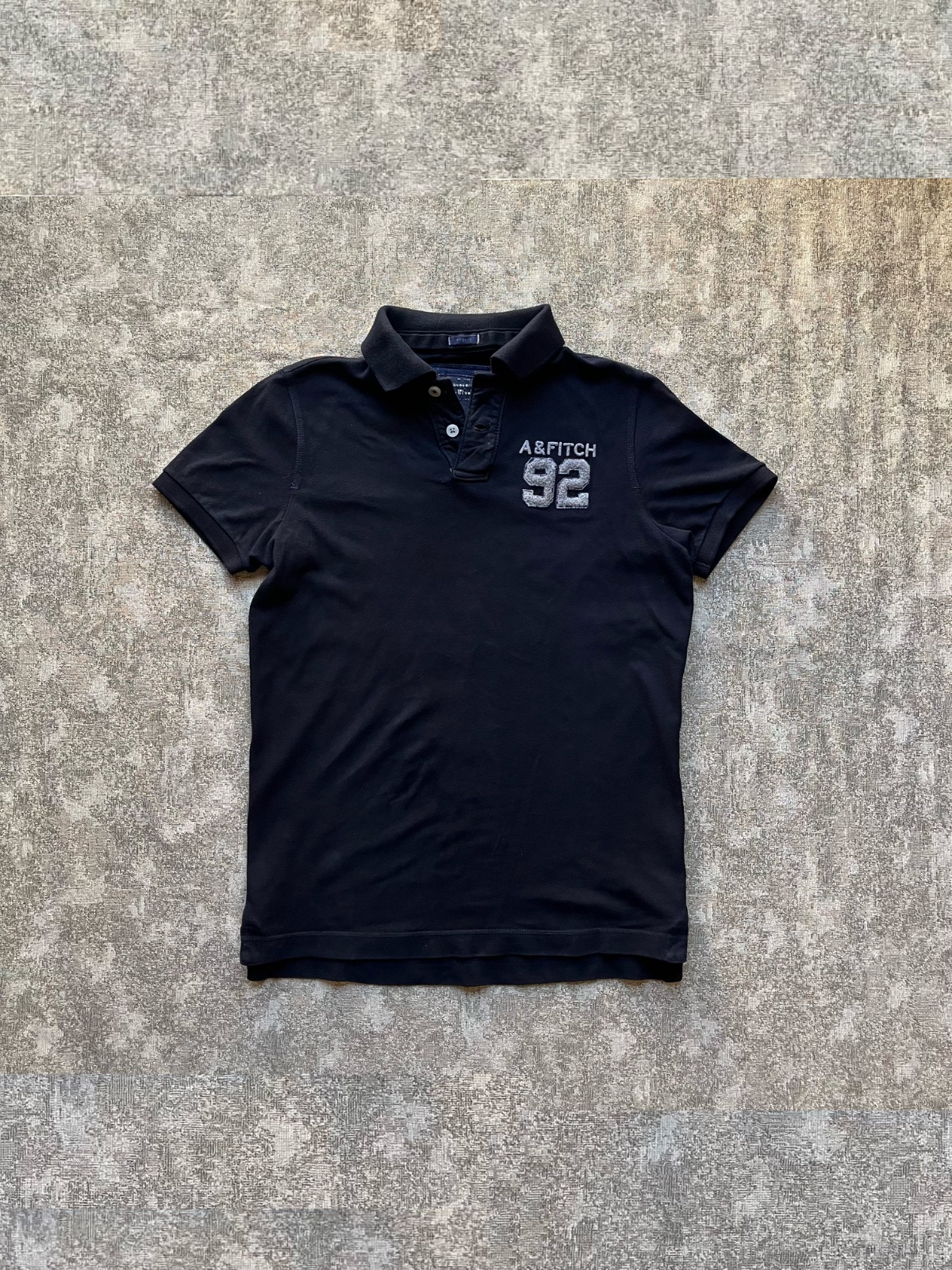 Black polo shirt