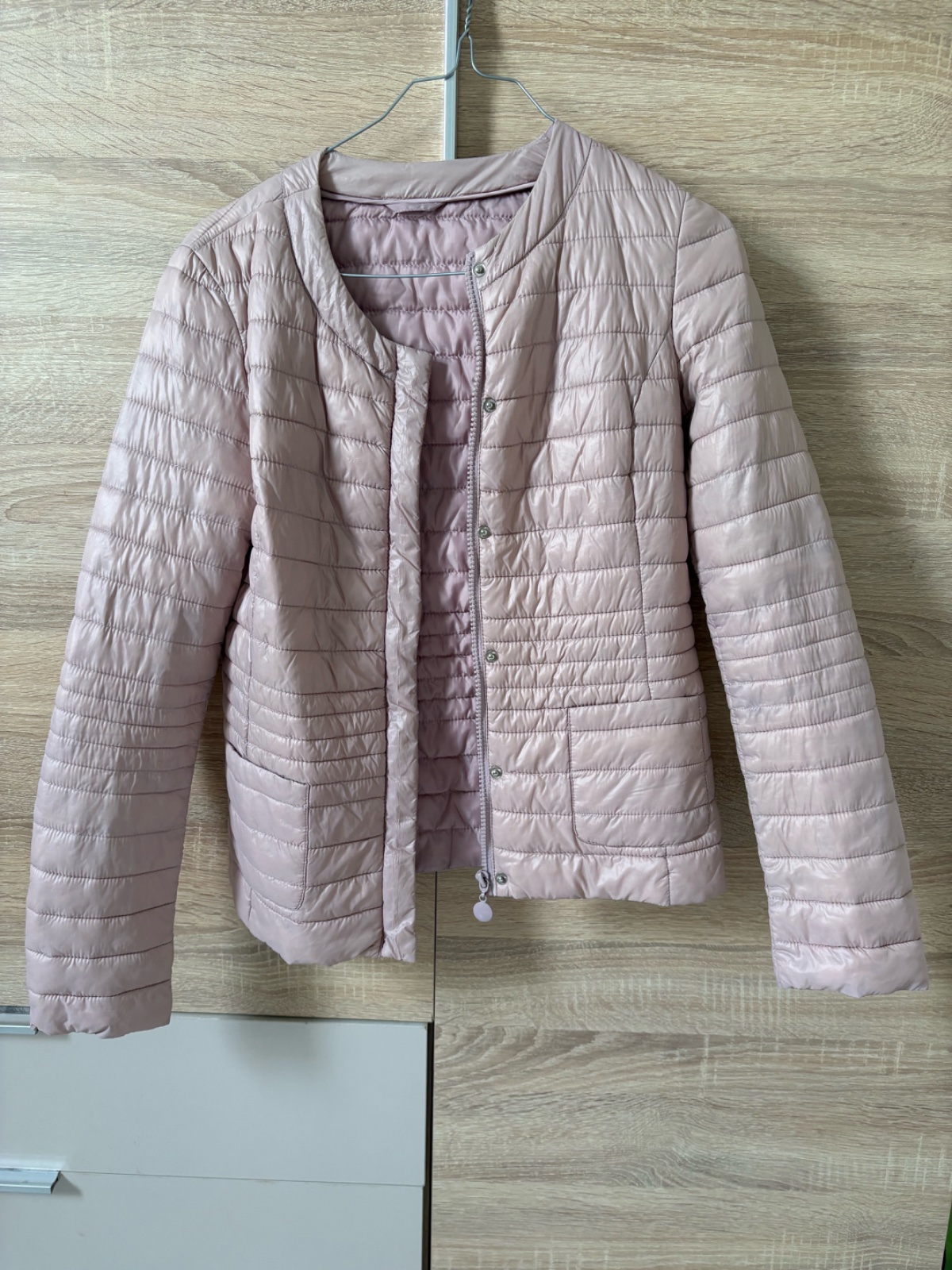 Petite doudoune en rose poudrée 