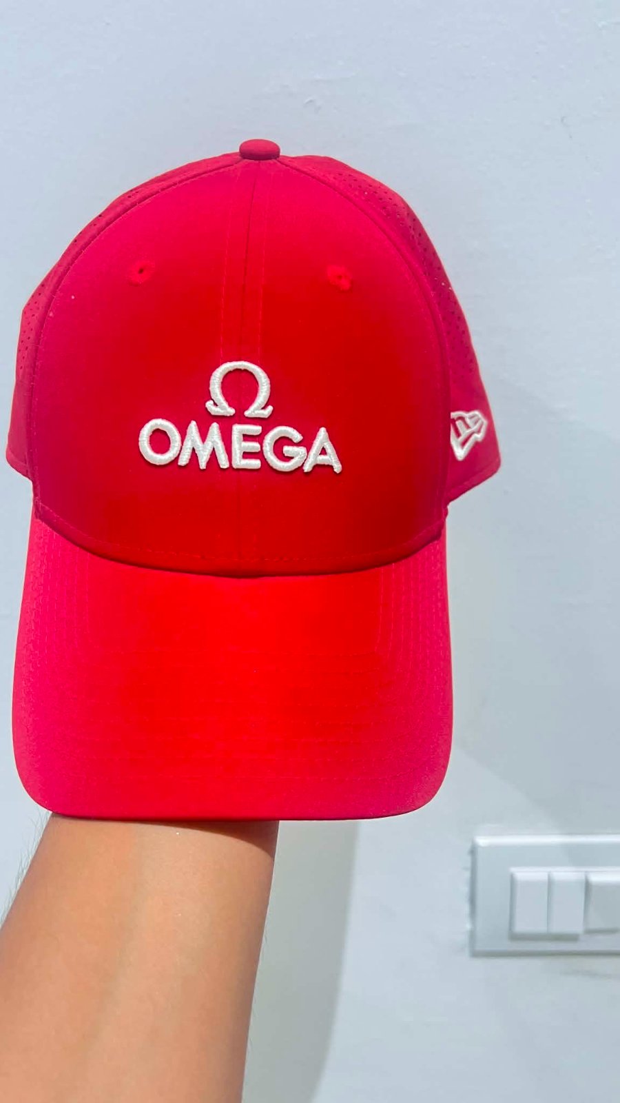 Casquette Omega . Marque new era 