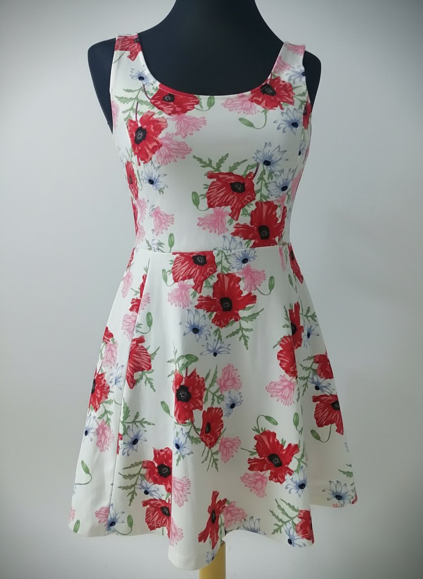 Jolie mini robe fleurie taille M