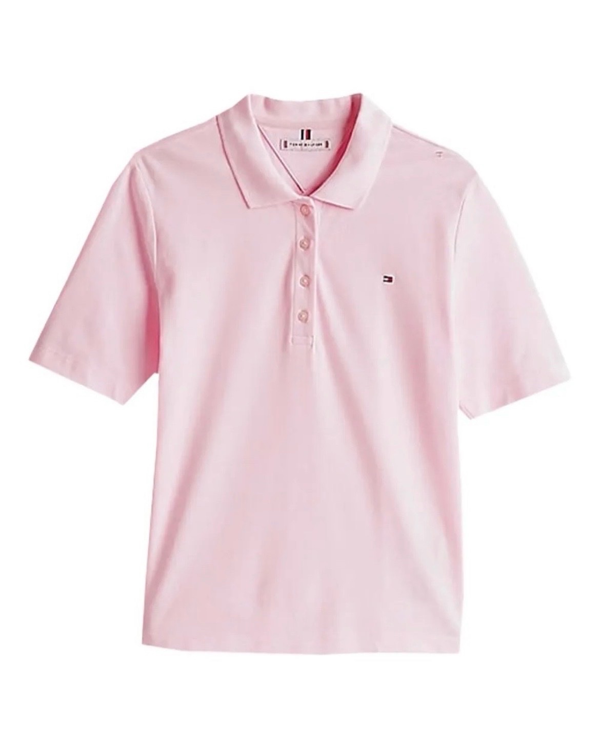 Ce polo Tommy Hilfiger rose pâle se distingue par sa patte de boutonnage classique et son logo brodé discret sur la poitrine