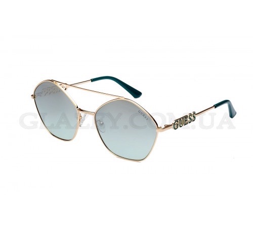 Lunettes de soleil aviateur Guess pour femme avec une monture dorée et des verres dégradés bleus/verts 
