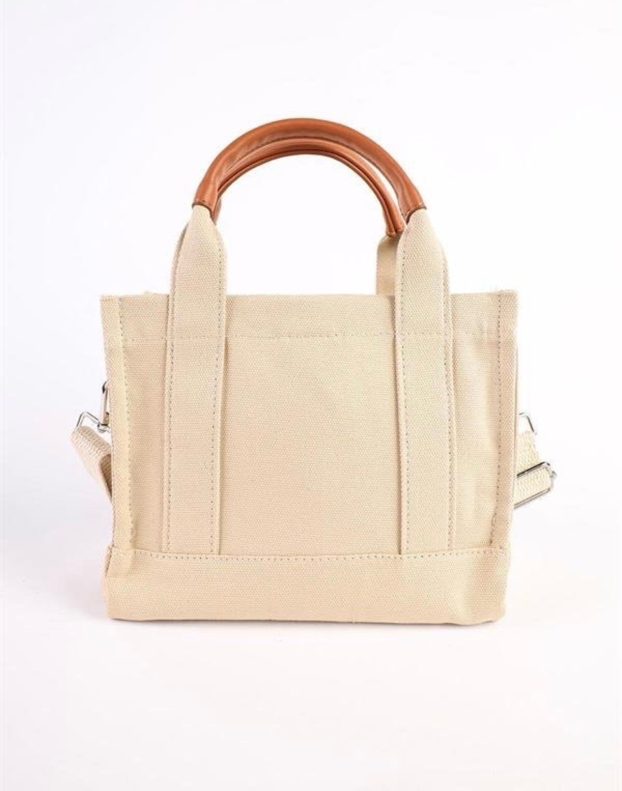 This is a Mopia Cream Women's Canvas Crossbody Tote Bag C&A