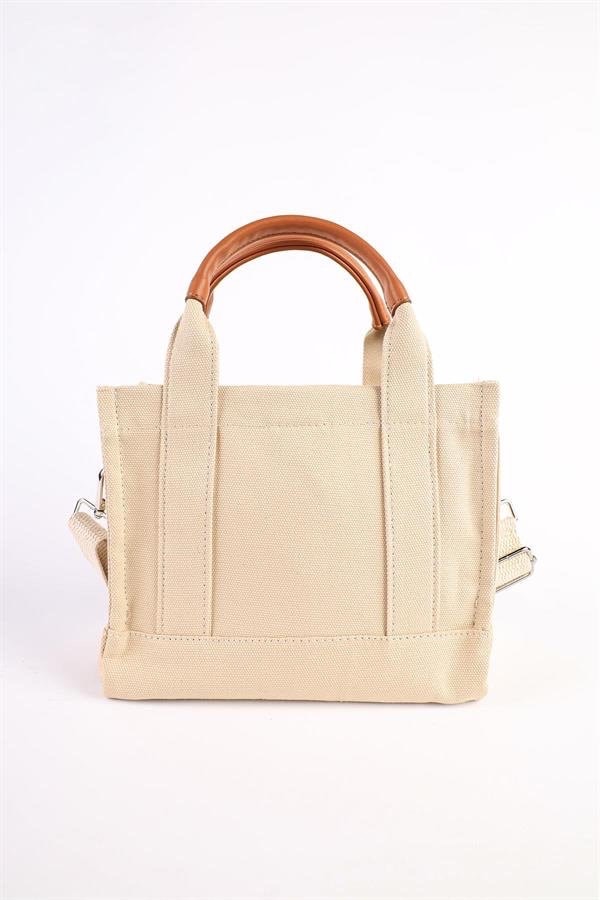 This is a Mopia Cream Women's Canvas Crossbody Tote Bag C&A