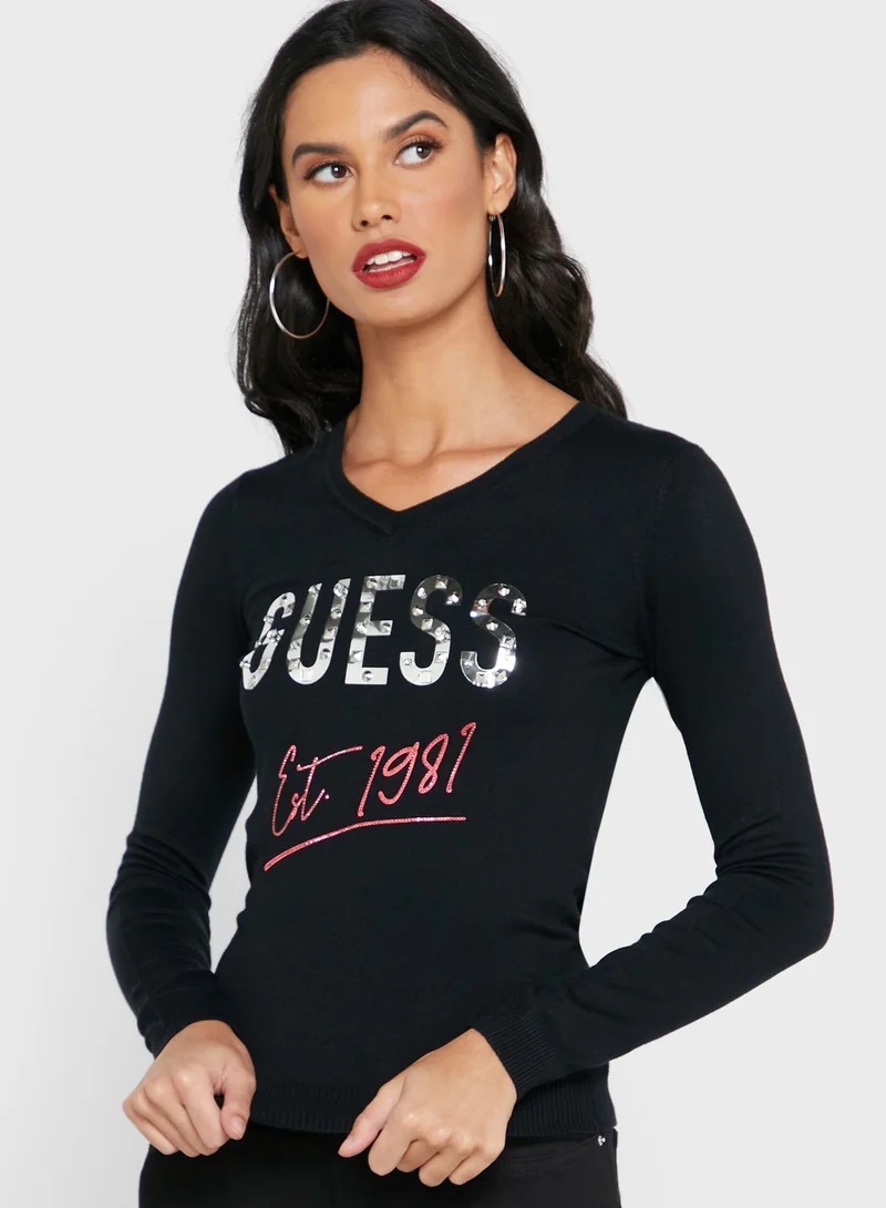 C'est un t-shirt à manches longues Guess Logo Icon noir T(S\M)