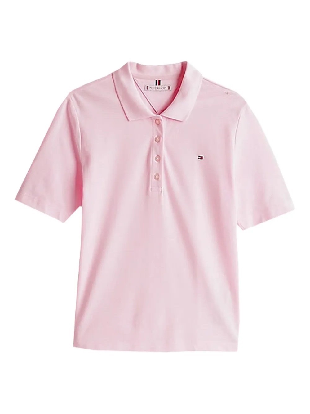 Ce polo Tommy Hilfiger rose pâle se distingue par sa patte de boutonnage classique et son logo brodé discret sur la poitrine