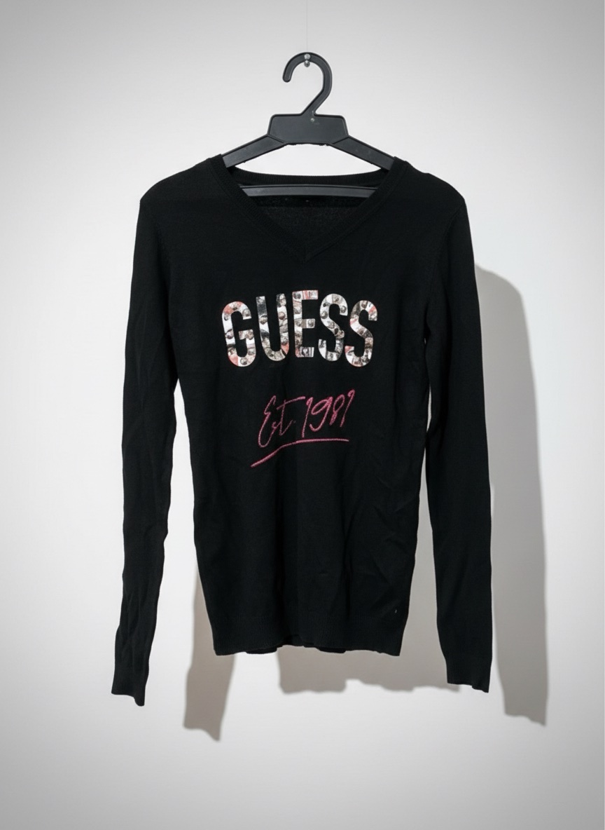 C'est un t-shirt à manches longues Guess Logo Icon noir 