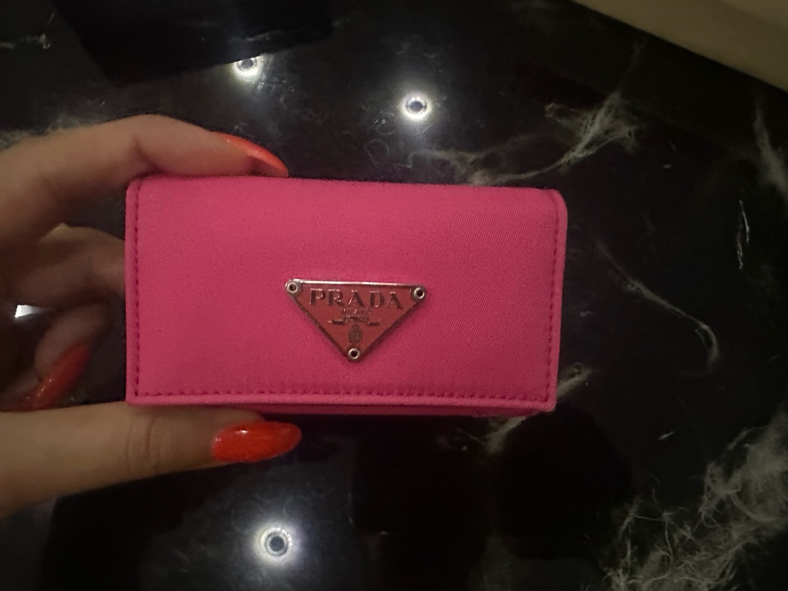 Portefeuilles Prada