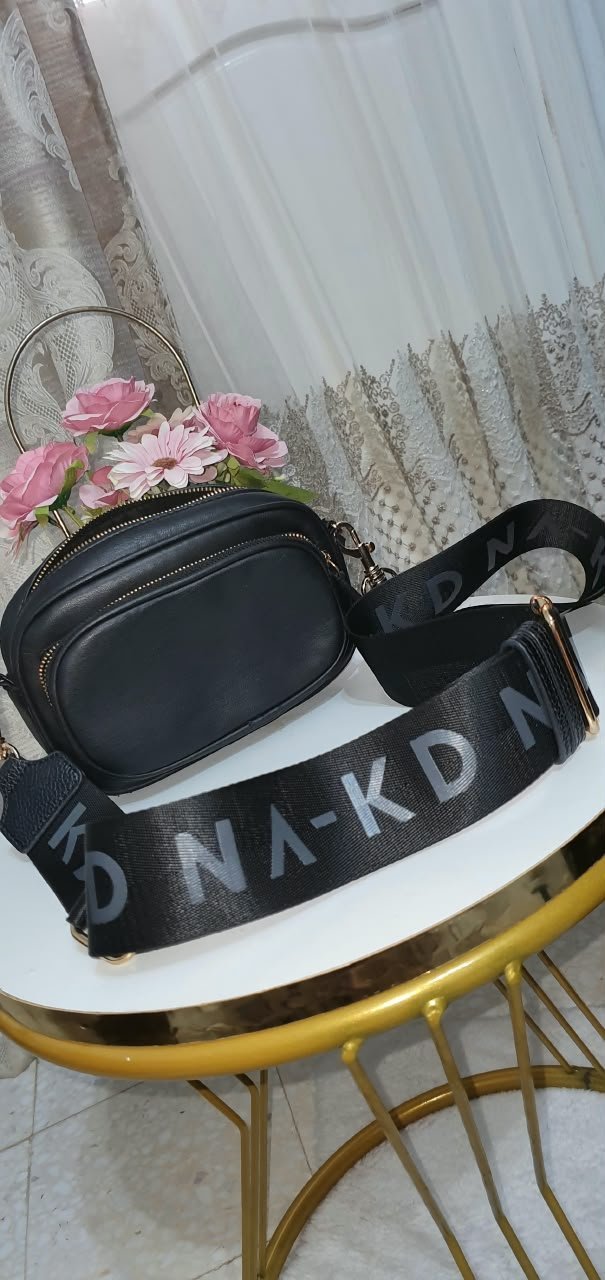 Pochette noir de la marque H&M