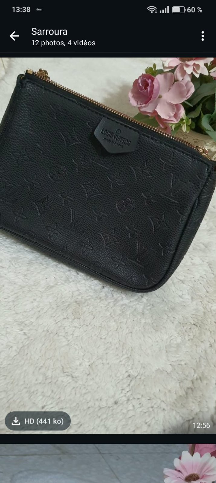 Pochette noir de la marque Louis Viton