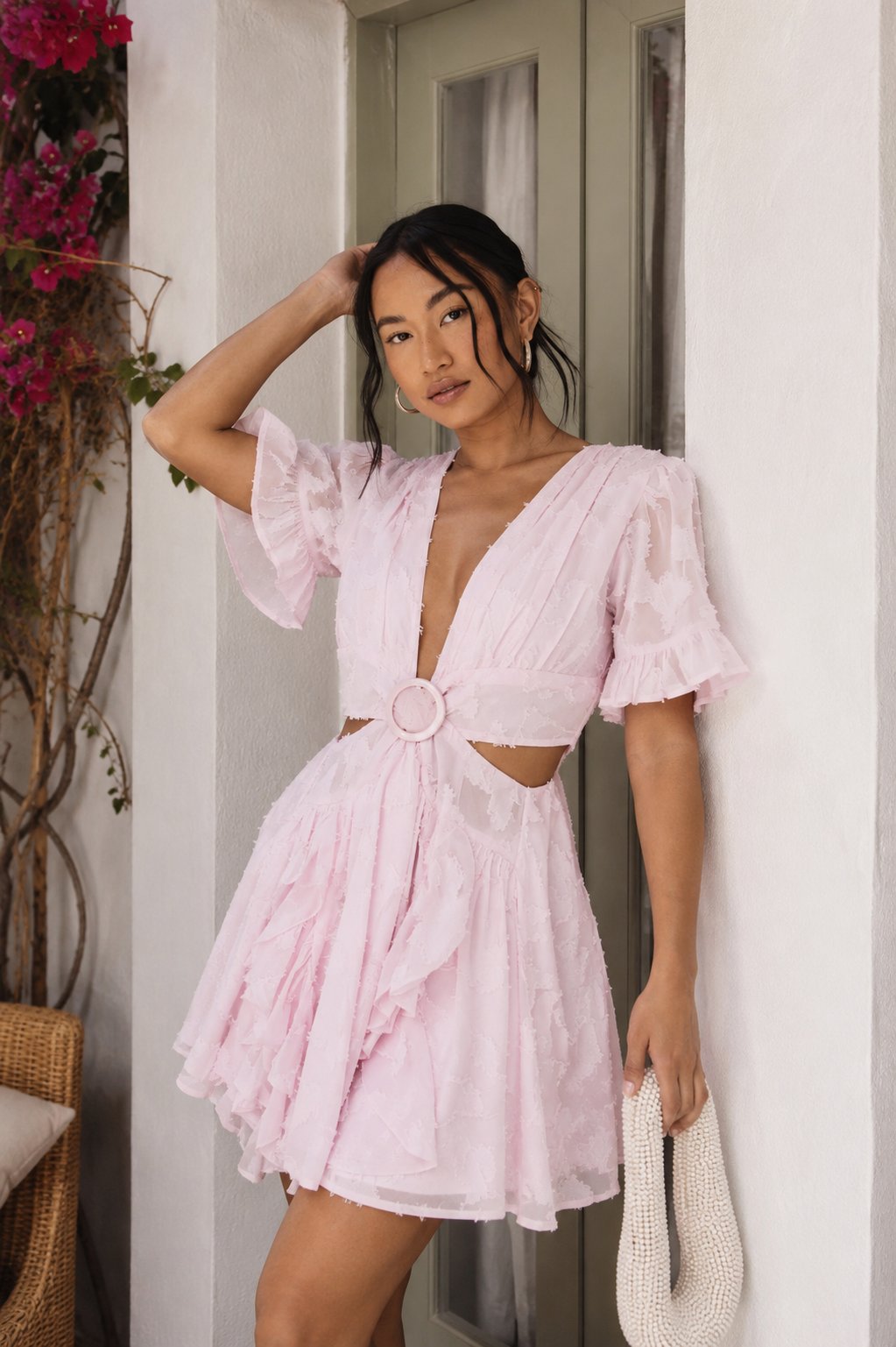 Robe patineuse en mousseline à motifs floraux, dotée d'un décolleté plongeant audacieux