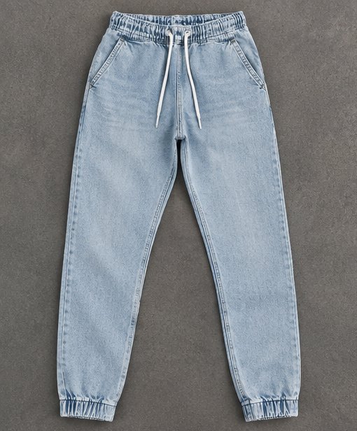 Jean jogger bleu clair JOGGET 👖💙 Taille 36, confortable et décontracté, avec cordon de serrage et bas élastiqué.