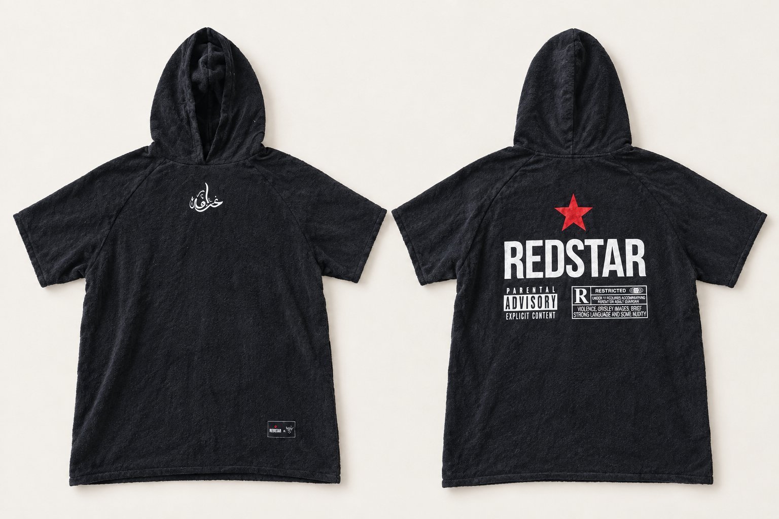 Poncho noir à capuche REDSTAR, tissu doux, manches courtes et imprimés originaux devant et derrière. Bon état.