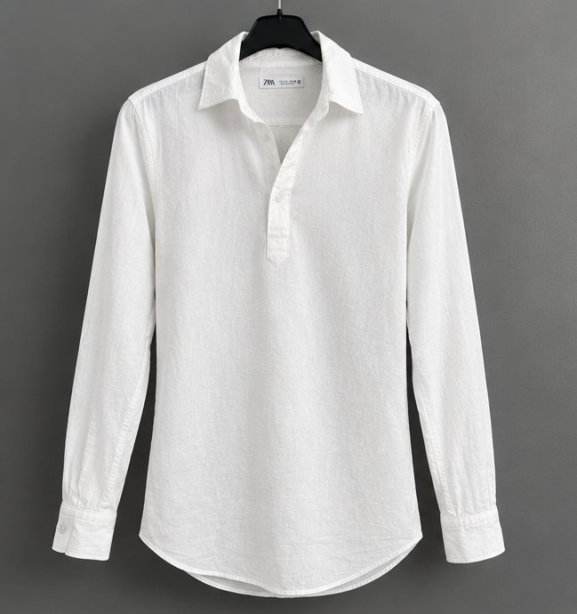 Chemise ZARA blanche à manches longues, coupe élégante et tissu léger. Très bon état, propre et soignée.