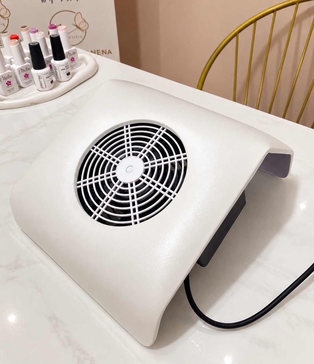 Aspirateur manucure repose mains