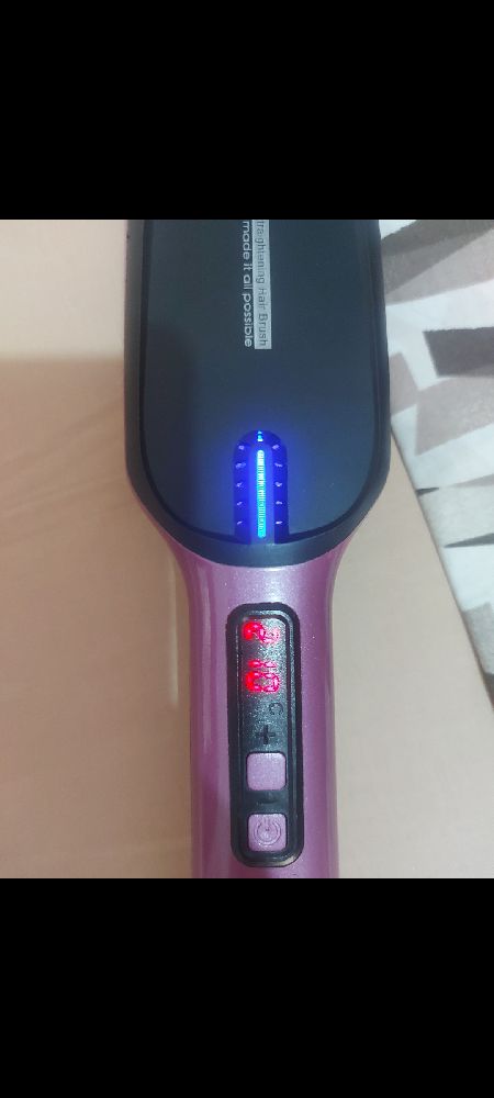 Brosse chauffante presque neuf 