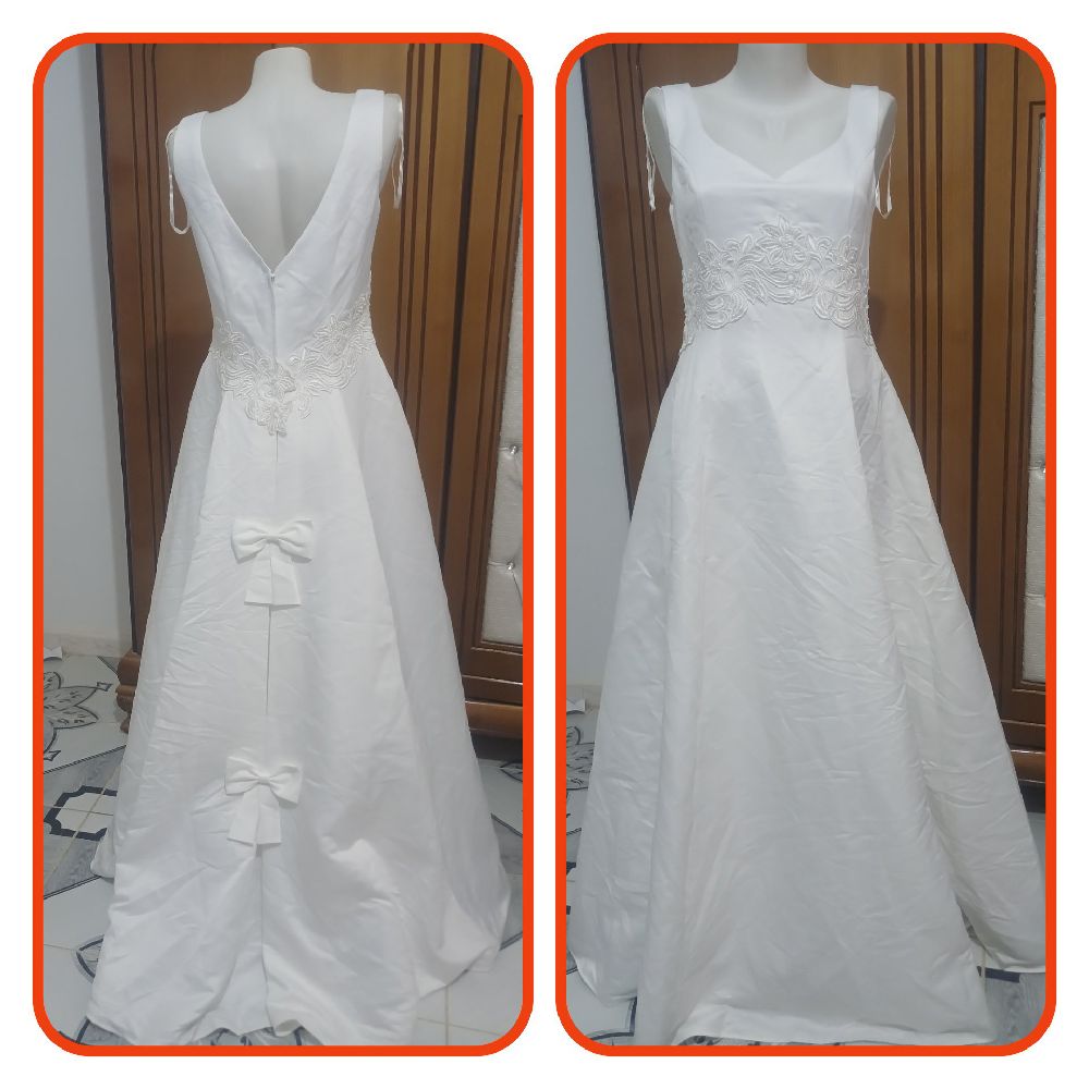 Robe de mariée importée de l'Allemagne.  Taille 40/L. Neuve avec étiquette 🏷 🏷 🏷 