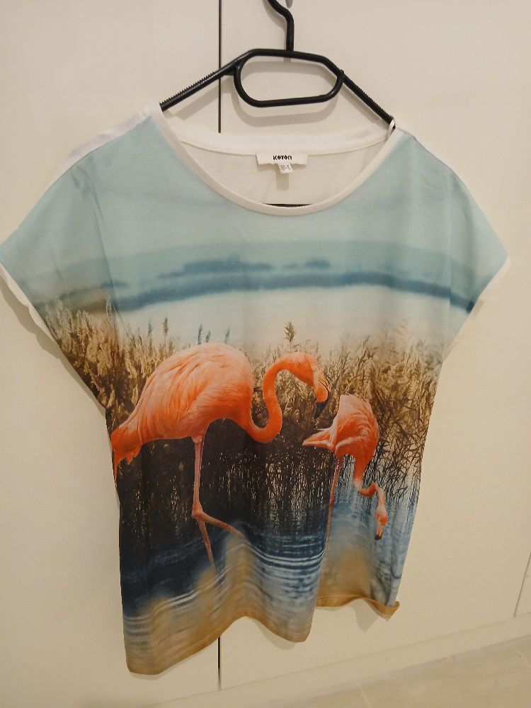  Lot composé d'un pull koton et une Jupe Koton 