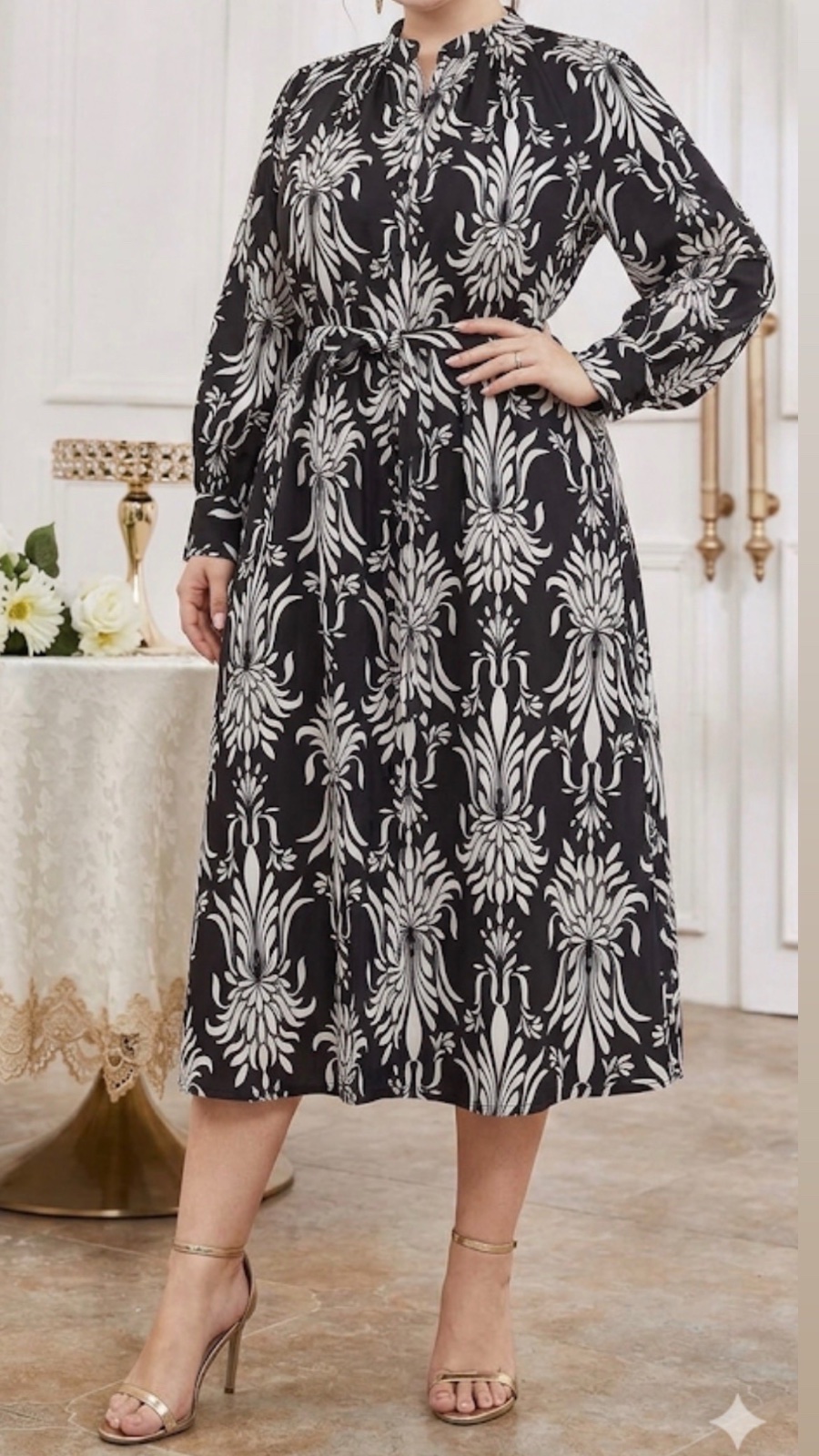 Une élégante robe midi chemise pour femme grande taille