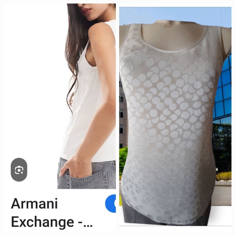 En promo,Petit haut urbain ARMANI neuffff.