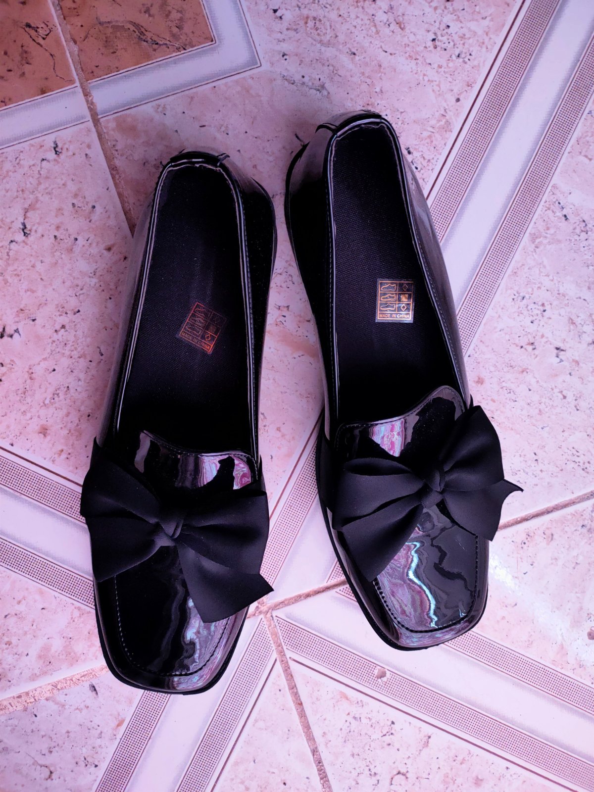 Black patent loafers