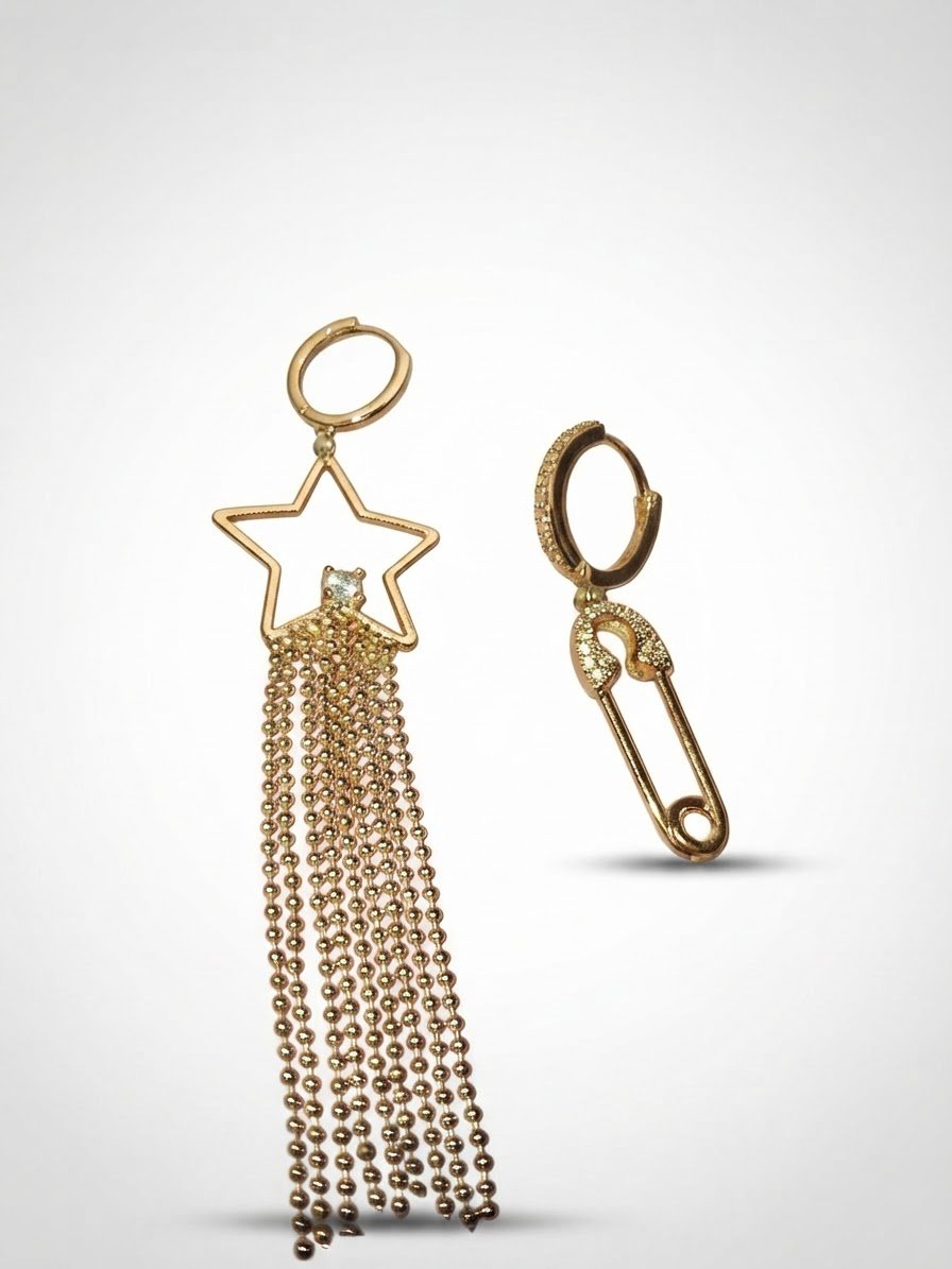 Boucles d'oreilles asymétriques rosées étoile avec chaînettes et épingle à nourrice