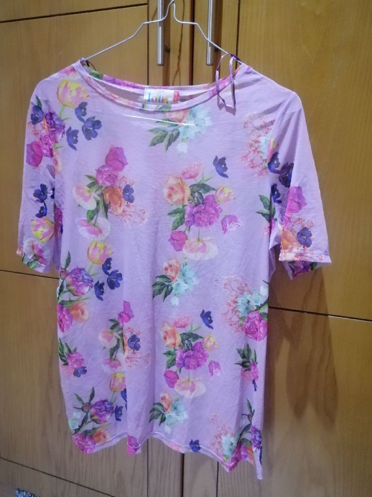 Pull fleuri transparent 