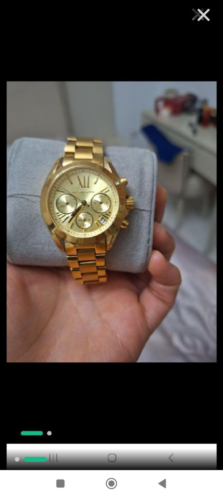 Montre michael kors en doré jamais porté avec son carte