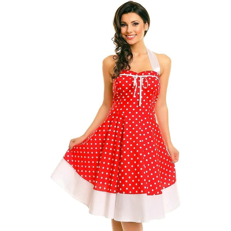  robe Dolly and Dotty arbore un motif à pois rouges et blancs ainsi qu'un haut dos nu.