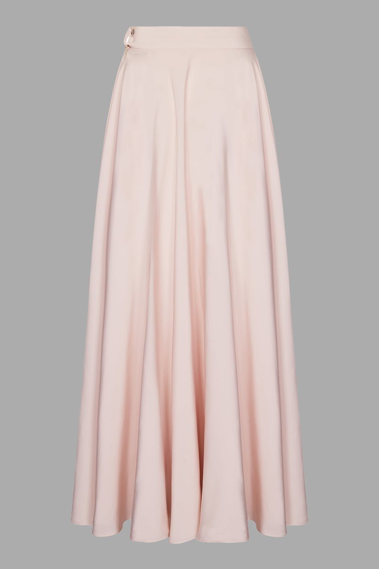 Jupe longue rose de chez Formula Joven présente une coupe évasée et une texture satinée élégante longueur 100 cm