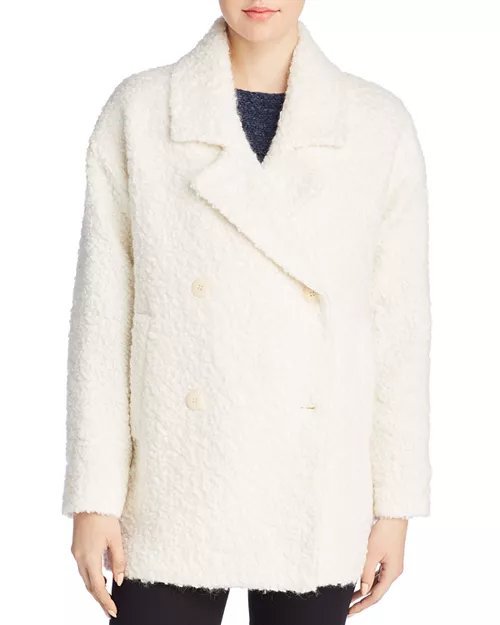 Un manteau oversize Max Mara Studio en laine couleur écru 