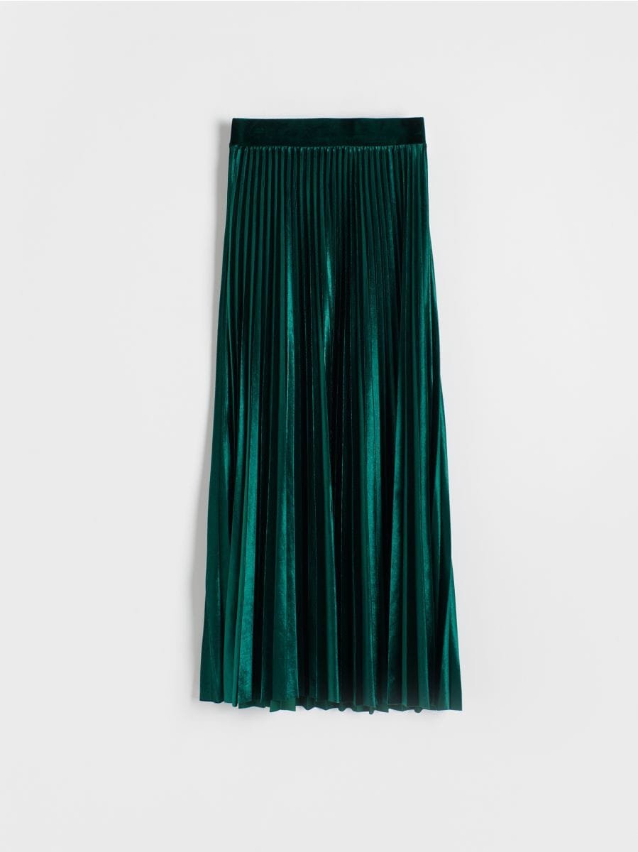 Jupe longue plissée en velours vert. 