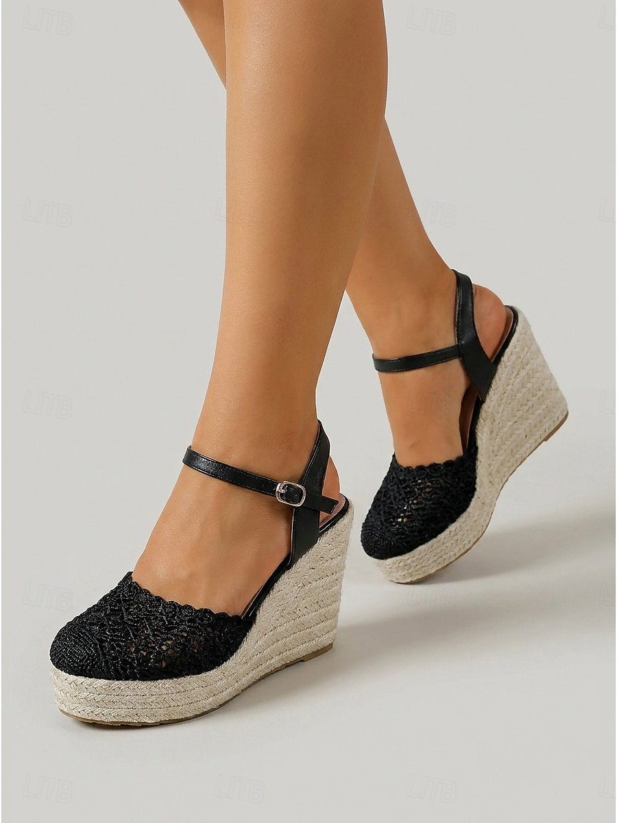 Sandales compensées pour femmes avec un talon en jute tressé et une empeigne en dentelle noire ajourée