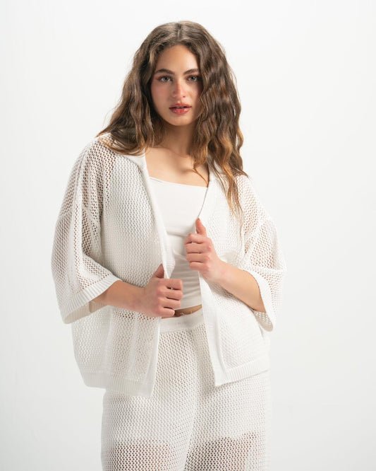 Cardigan blanc Esmara est fabriqué en tricot ajouré léger avec des manches chauve-souris